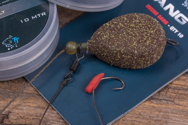 7. Další konec Armourlink navažte k očku obratlíku uchyceného nad inline zátěží. Začněte s délkou okolo 8 - 12 cm. Koncová montáž je kompletní.