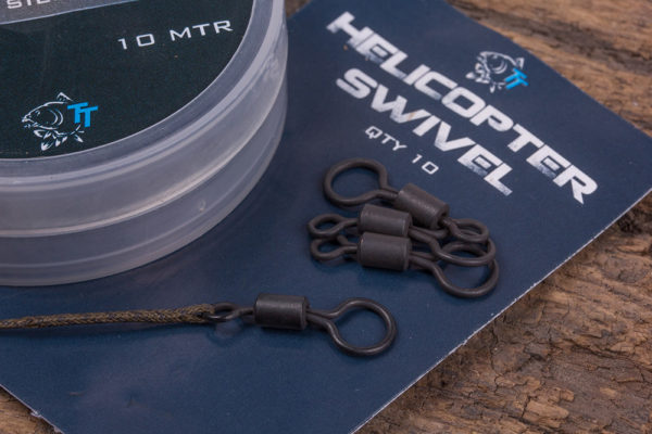 1. Menší očko obratlíku na helikoptérové montáže navažte na jeden konec 18 palců dlouhého materiálu Cling-On Leader, vytvořte malé očko na druhém konci. Zde se pak naváže kmenový vlasec. 